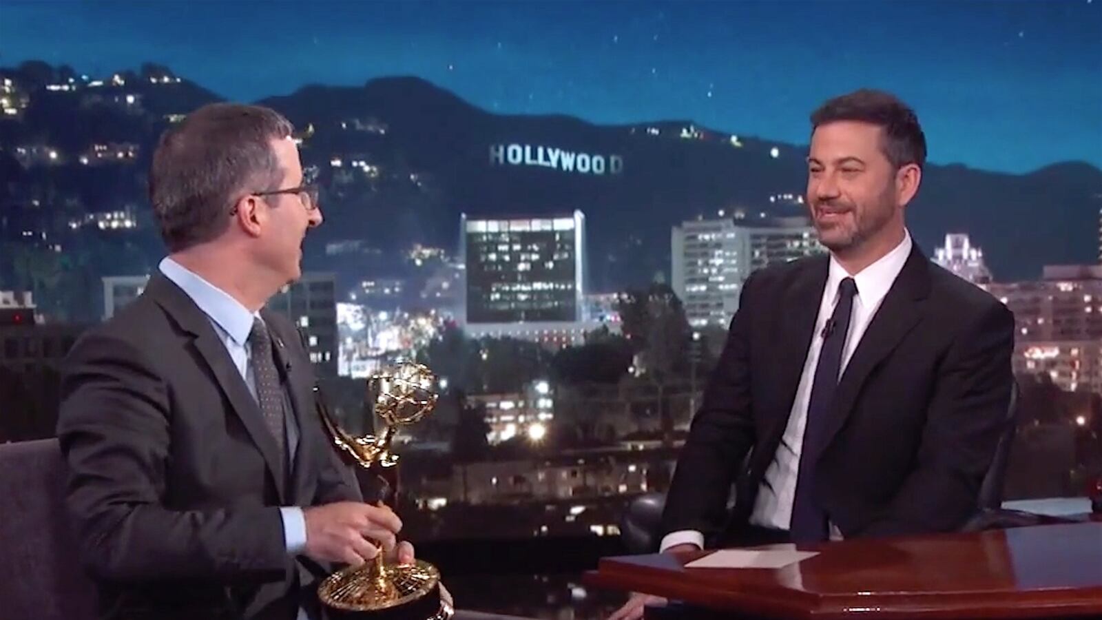 articles/2016/09/20/john-oliver-rubs-his-emmy-in-kimmel-s-face-on-jimmy-kimmel-live/160919-wilstein-john-oliver-kimmel-tease_o21cmg