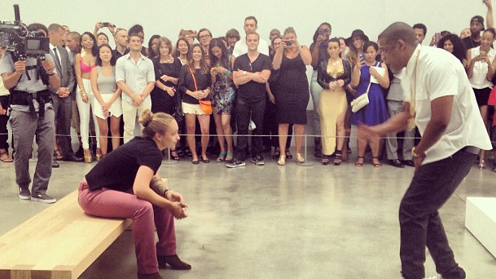 articles/2013/08/08/lady-gaga-jay-z-john-lennon-more-celebs-doing-performance-art/130710-wilkinson-jayzgallery-tease_bigxrr