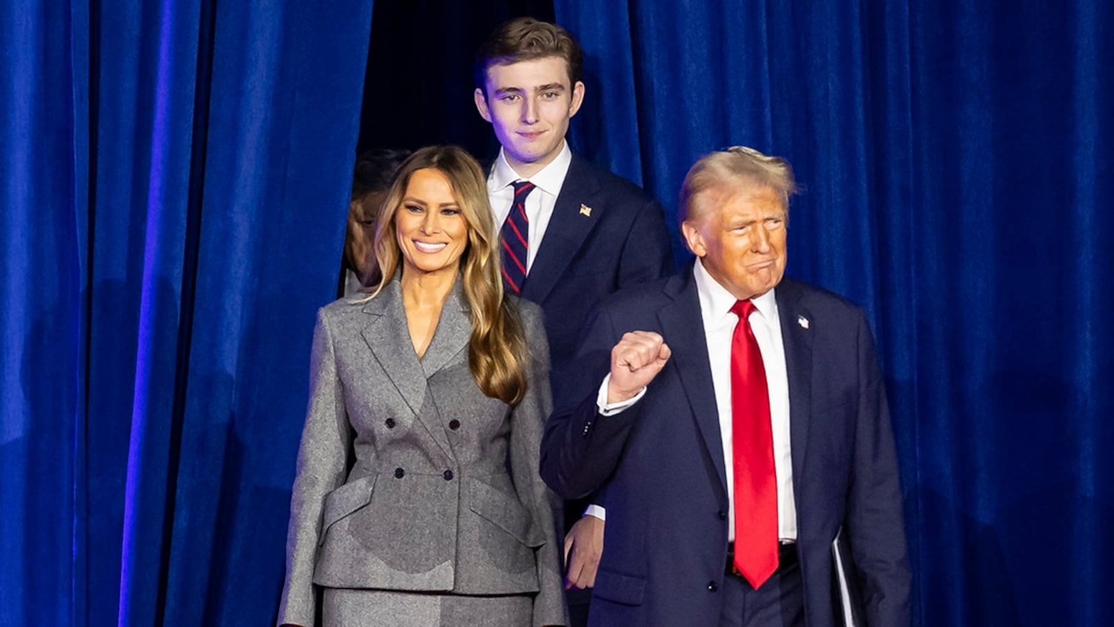 Republican presidential nominee former President Donald Trump arrives to his election night party alongside his wife, Melania Trump, and his son, Barron Trump, at the Palm Beach County Convention Center on Tuesday, Nov. 5, 2024, in West Palm Beach, Florida. (Matias J. Ocner/Miami Herald/Tribune News Service via Getty Images)
