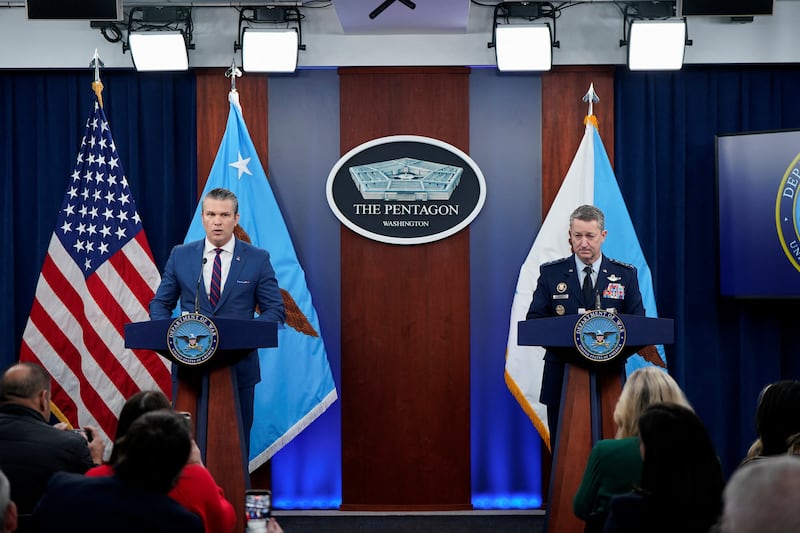 U.S. Secretary of Defense Pete Hegseth and Chairman of the Joint Chiefs of Staff General Dan Caine hold a briefing amid the U.S.-Israeli conflict with Iran, at the Pentagon in Washington, D.C., U.S., March 2, 2026. REUTERS/Elizabeth Frantz