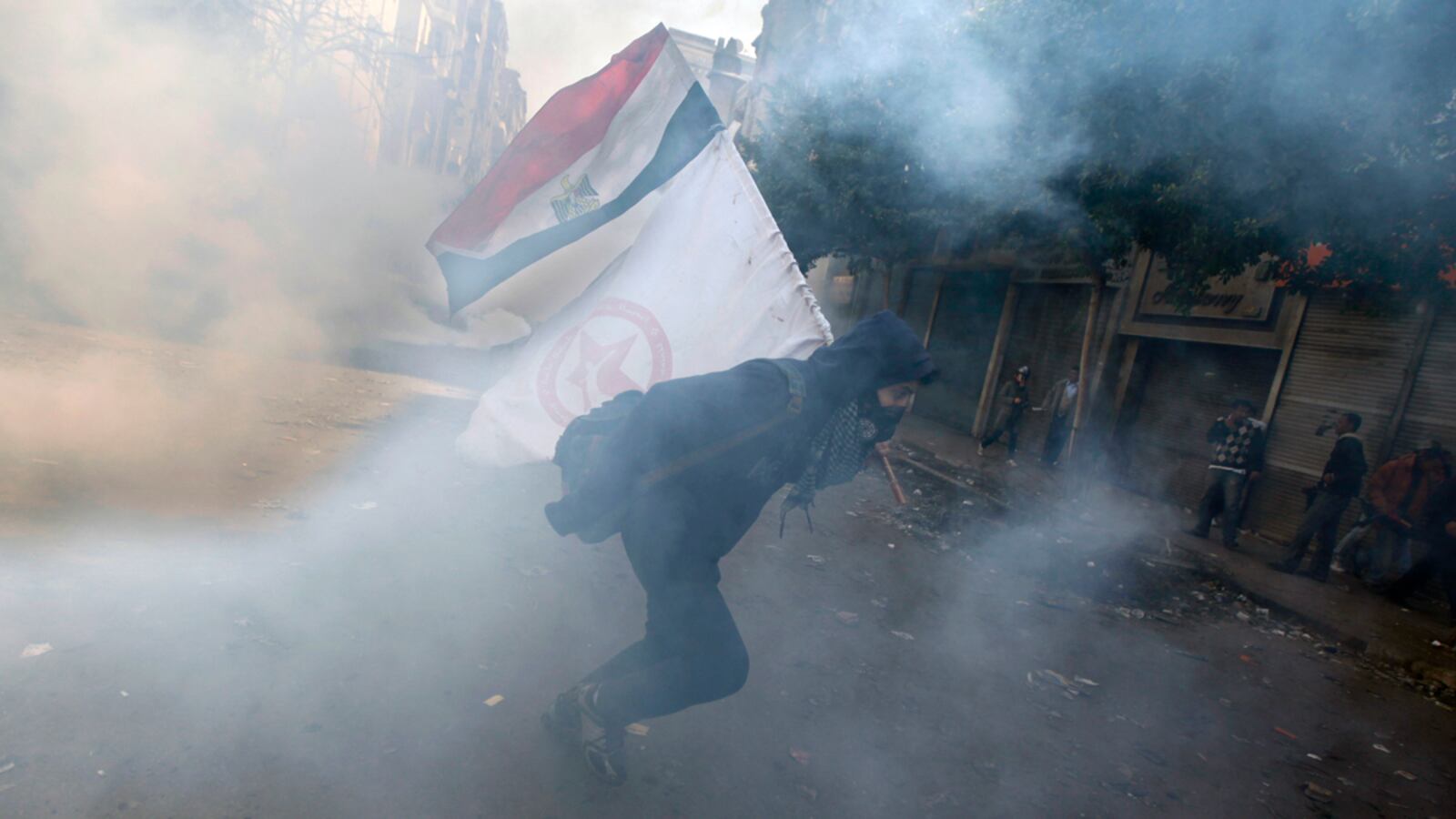 cheats/2012/02/05/egypt-police-tear-gas-tahrir/egypt-police-tear-gas-tahrir-square-cs_ikmd7p