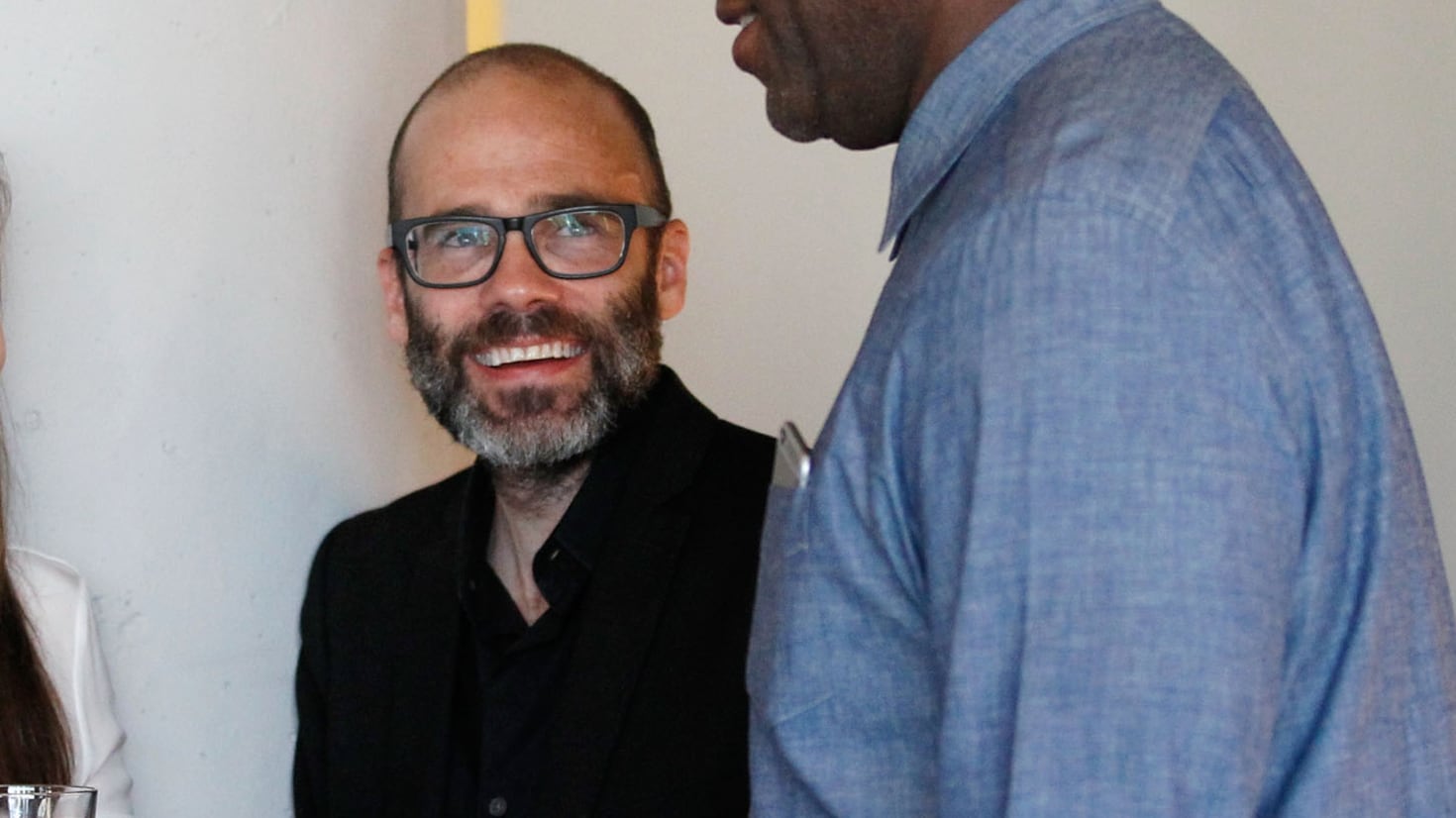 WIRED Director of Photography Patrick Witty (C), and Apple News Director Wyatt Mitchell (R) celebrate the launch of the July Issue at the new WIRED office on June 24, 2015 in San Francisco, California. (Photo by Kimberly White/Getty Images for WIRED)