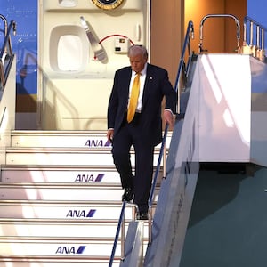 U.S. President Donald Trump disembarks Air Force One as he arrives at Haneda Airport on October 27, 2025 in Tokyo, Japan.