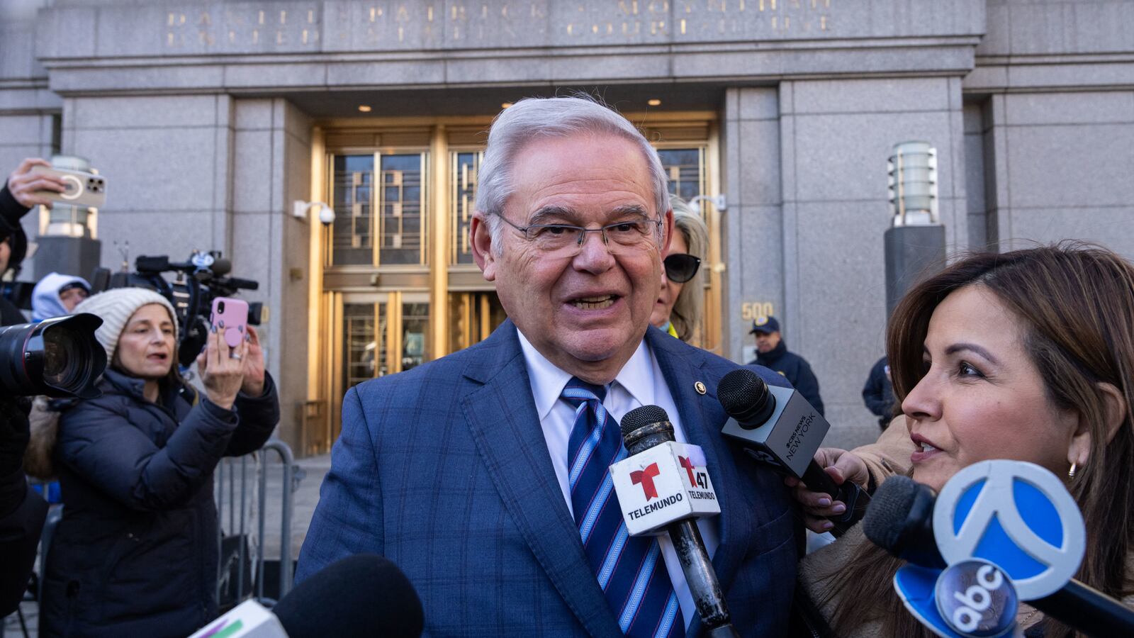 US Senator Bob Menendez (c), Democrat of New Jersey, speaks to members of the media outside the Manhattan Federal Court, in New York City following his arraignment on March 11, 2024.
