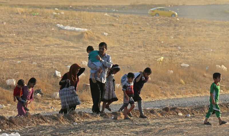galleries/2014/06/16/thousands-flee-violence-in-iraq-photos/140616-iraq-refugees-13_ty4wt2