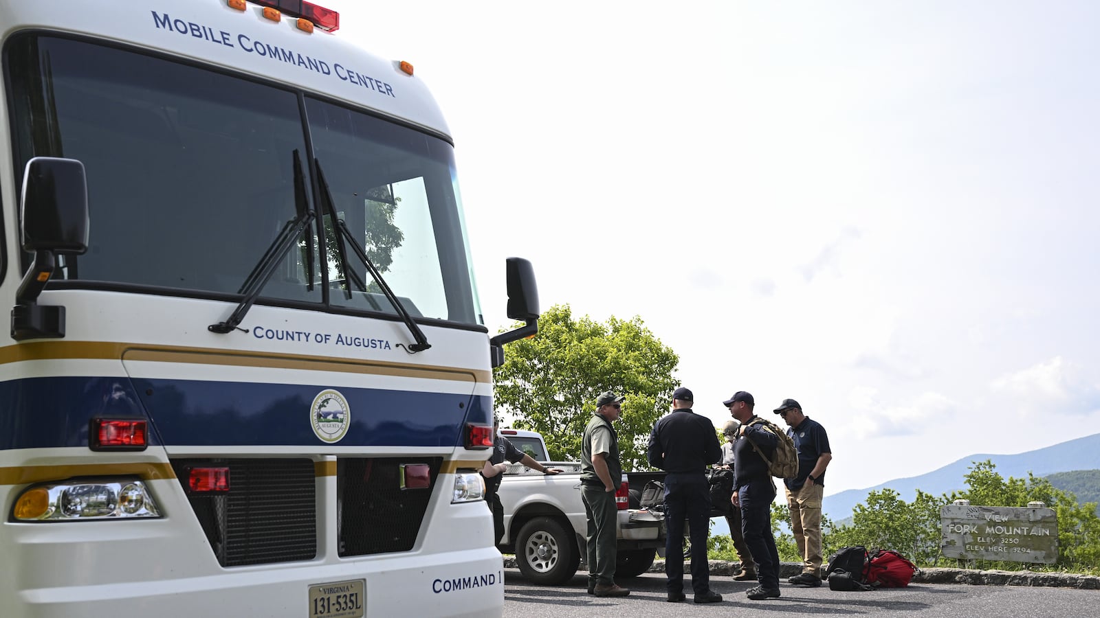 Search team near the crash site of a plane in virginia
