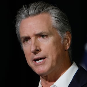 STOCKTON, CALIFORNIA - OCTOBER 22: California Gov. Gavin Newsom speaks to reporters after he participated in a fireside chat at the California Economic Summit on October 22, 2025 in Stockton, California. Gov. Newsom answered questions about the Trump administration's plans to deploy border patrol officers and the National Guard to San Francisco. (Photo by Justin Sullivan/Getty Images)