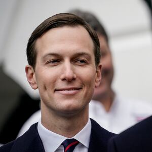 WASHINGTON, DC - JANUARY 29: (L-R) Senior Advisor Jared Kushner looks on as U.S. President Donald Trump speaks before signing the United States-Mexico-Canada Trade Agreement (USMCA) during a ceremony on the South Lawn of the White House on January 29, 2020 in Washington, DC. The new U.S.-Mexico-Canada Agreement (USMCA) will replace the 25-year-old North American Free Trade Agreement (NAFTA) with provisions aimed at strengthening the U.S. auto manufacturing industry, improving labor standards enforcement and increasing