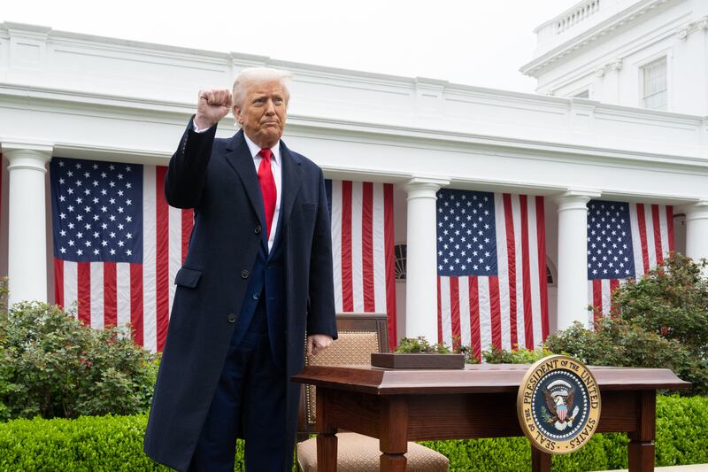 US President Donald Trump pumps his fist after signing an executive order after delivering remarks on reciprocal tariffs during an event in the Rose Garden entitled "Make America Wealthy Again" at the White House in Washington, DC, on April 2, 2025. Trump geared up to unveil sweeping new "Liberation Day" tariffs in a move that threatens to ignite a devastating global trade war. Key US trading partners including the European Union and Britain said they were preparing their responses to Trump's escalation, as nervous markets fell in Europe and America. (Photo by SAUL LOEB / AFP) (Photo by SAUL LOEB/AFP via Getty Images)