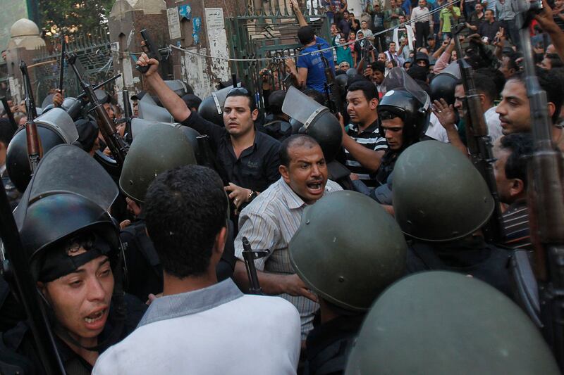 articles/2013/08/17/it-s-time-to-hold-our-nose-and-back-egypt-s-military/130817-cairo-tease_kzragh