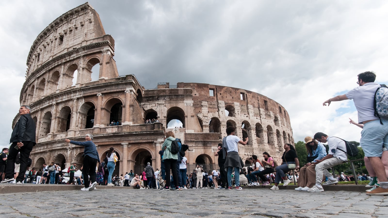Tourists admire the Colosseum in Rome, Italy, on April 26, 2025.
