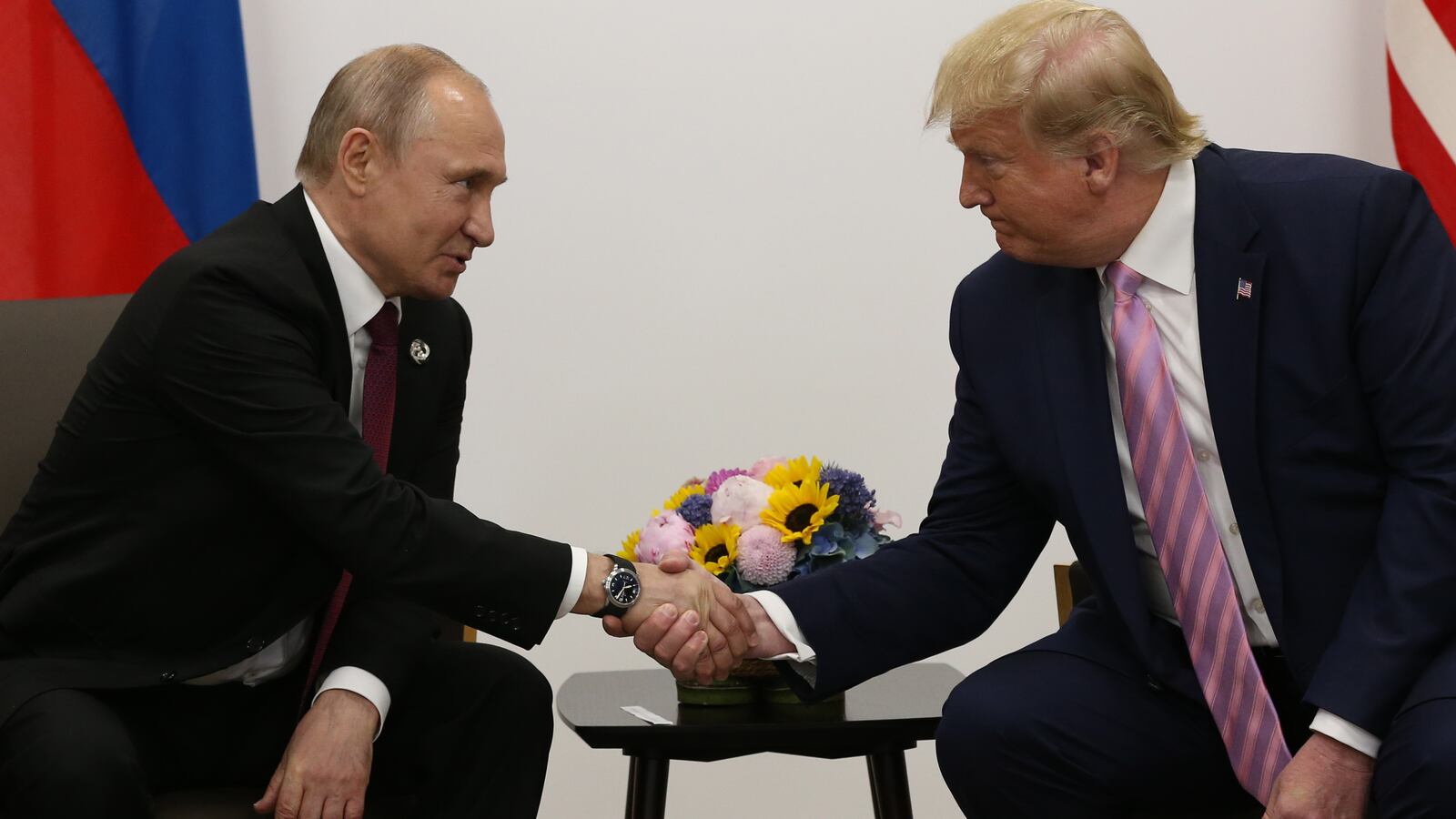 U.S. President Donald Trump (R) greets Russian President Vladimir Putin (L) during their bilateral meeting at the G20 Osaka Summit 2019, in Osaka, Japan, June,28, 2019.