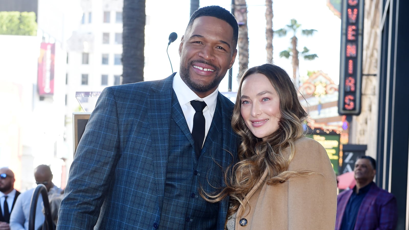 Michael Strahan poses with girlfriend Kaya Quick for his Walk of Fame star ceremony.