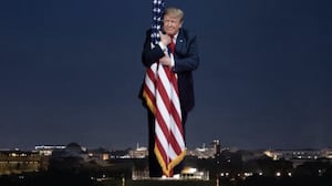 AI image of Trump hugging the American flag in front of the Washington Monument.