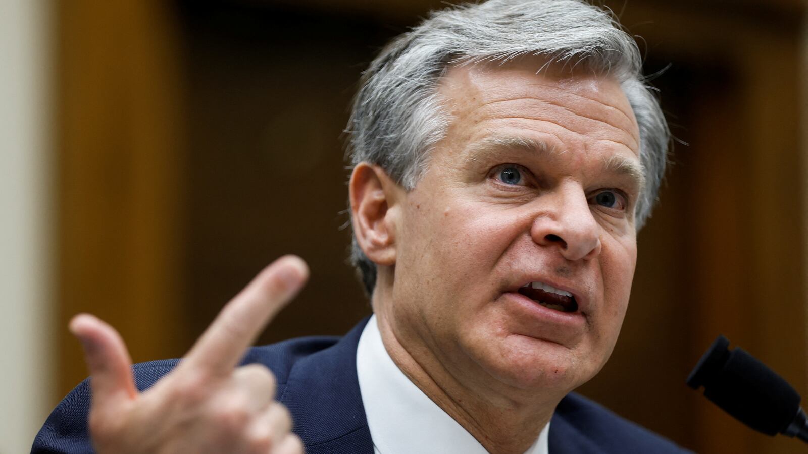 FBI Director Christopher Wray fielded questions from Republicans about Jan. 6 and the Covid-19 lab-leak theory.