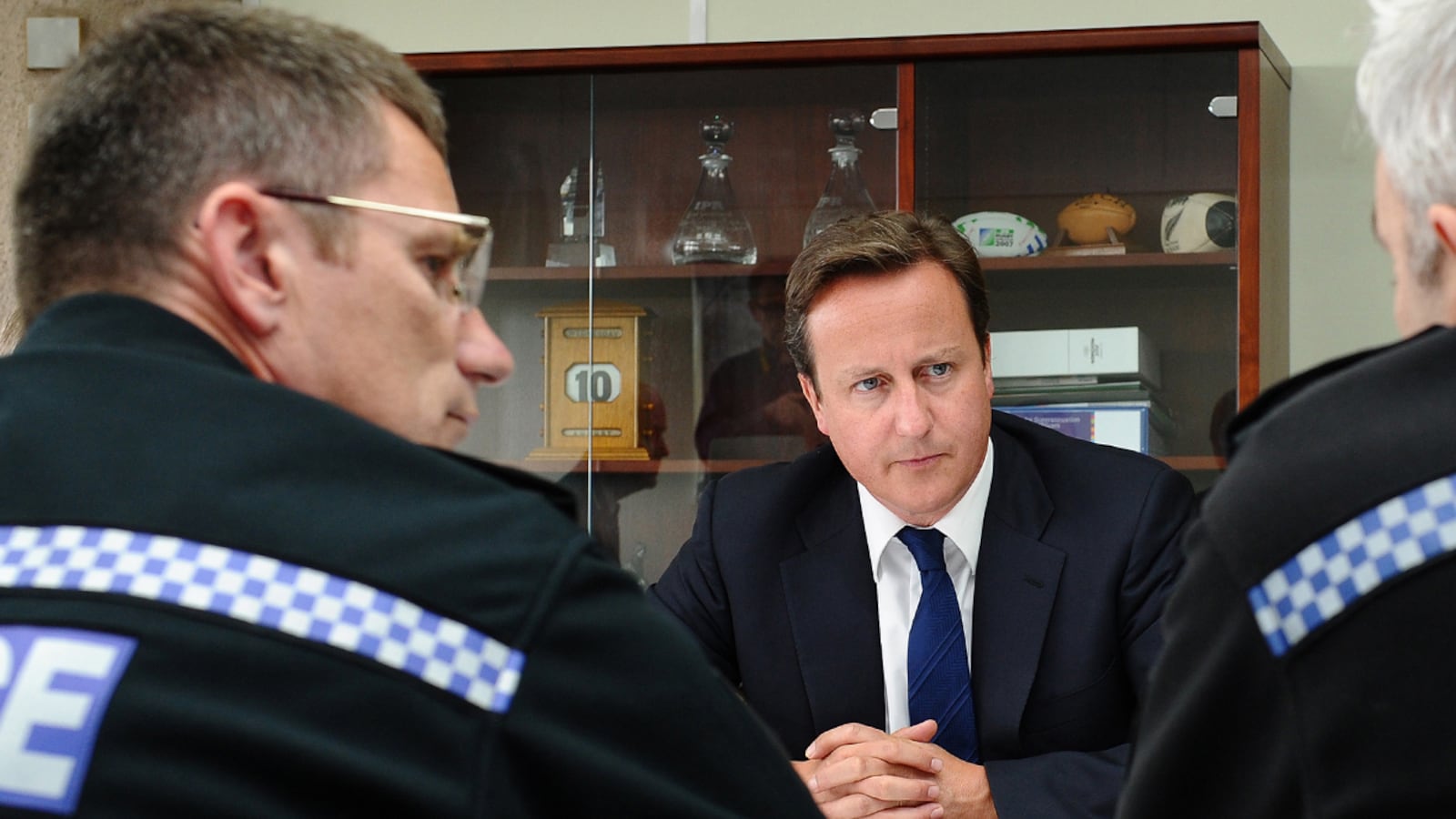 articles/2011/08/12/london-riots-david-cameron-versus-the-police/cameron-police-riots-underhill_tugpwf