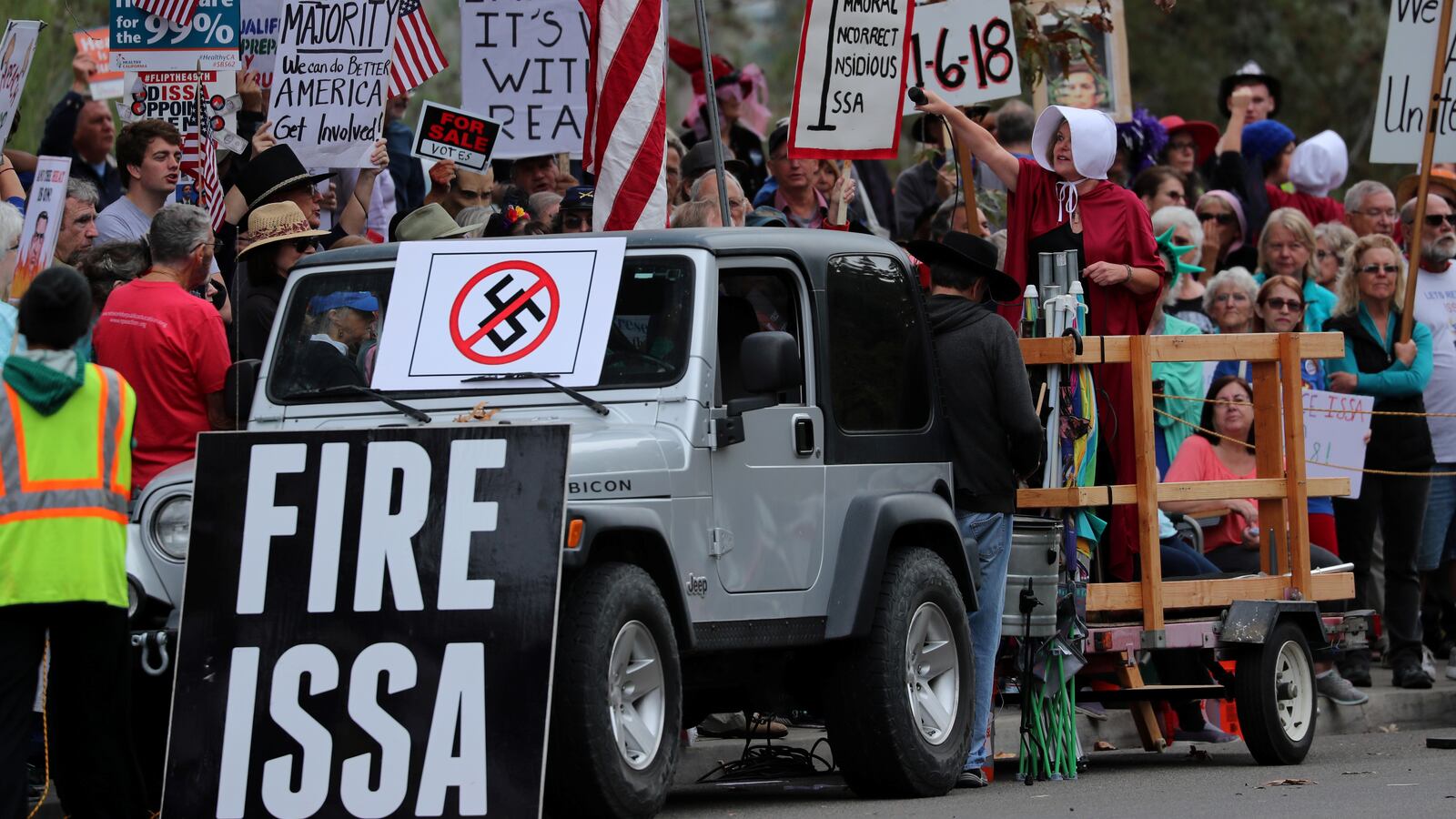 A protest against President Donald Trump and Rep. Darrell Issa (R-CA) outside Issa’s office in Vista, California, Oct. 31, 2017.