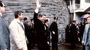 This photo taken by presidential photographer Mike Evens on March 30, 1981 shows President Ronald Reagan waving to the crowd just before the assassination attempt on him outside the Hilton Hotel in Washington, D.C.