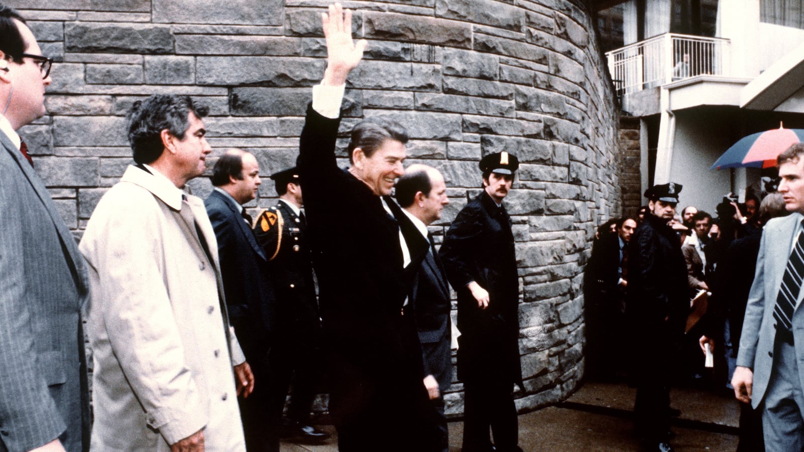This photo taken by presidential photographer Mike Evens on March 30, 1981 shows President Ronald Reagan waving to the crowd just before the assassination attempt on him outside the Hilton Hotel in Washington, D.C.
