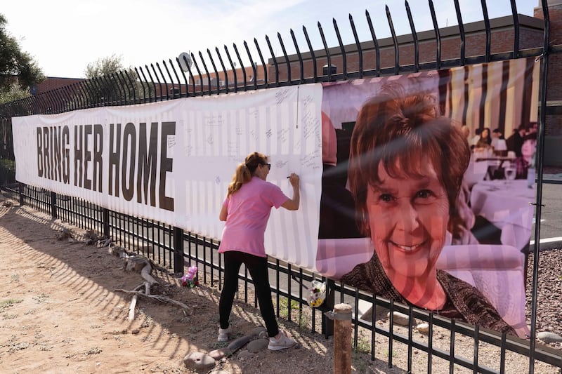 Sign pleads for Nancy guthrie's return.