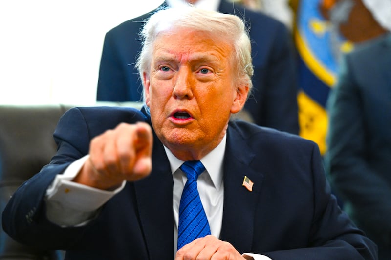 US President Donald Trump speaks before signing executive orders in the Oval Office in the White House in Washington, DC, on January 30, 2026.