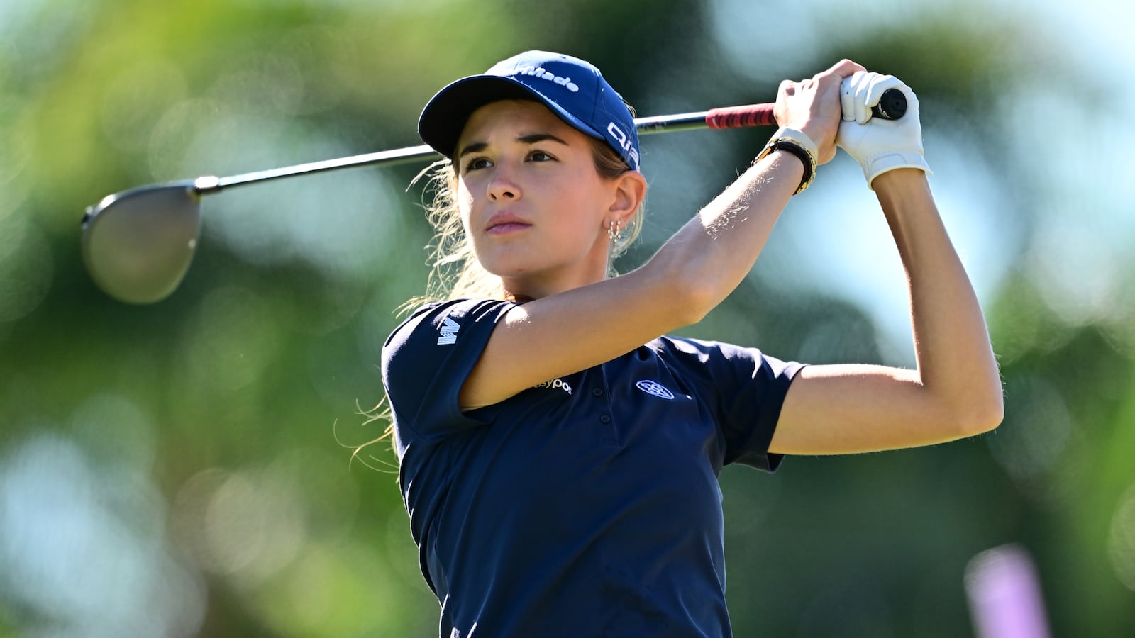 BELLEAIR, FLORIDA - NOVEMBER 13: Amateur Kai Trump of the United States plays her shot from the 16th tee during the first round of The ANNIKA driven by Gainbridge at Pelican 2025 at Pelican Golf Club on November 13, 2025 in Belleair, Florida. (Photo by Julio Aguilar/Getty Images)