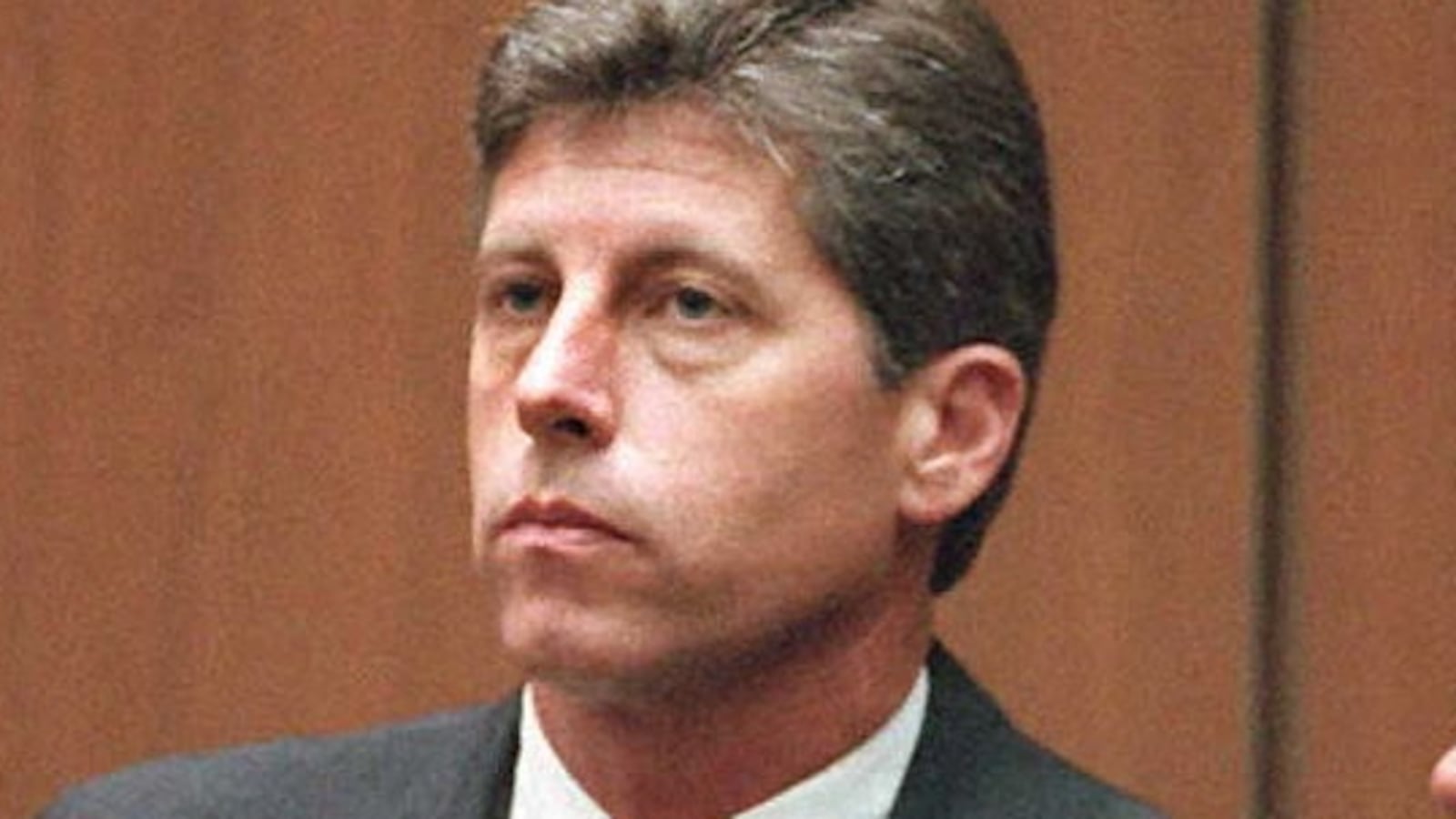 Former LAPD Detective Mark Fuhrman, left, takes to the witness stand in the O.J. Simpson double-murder trial.