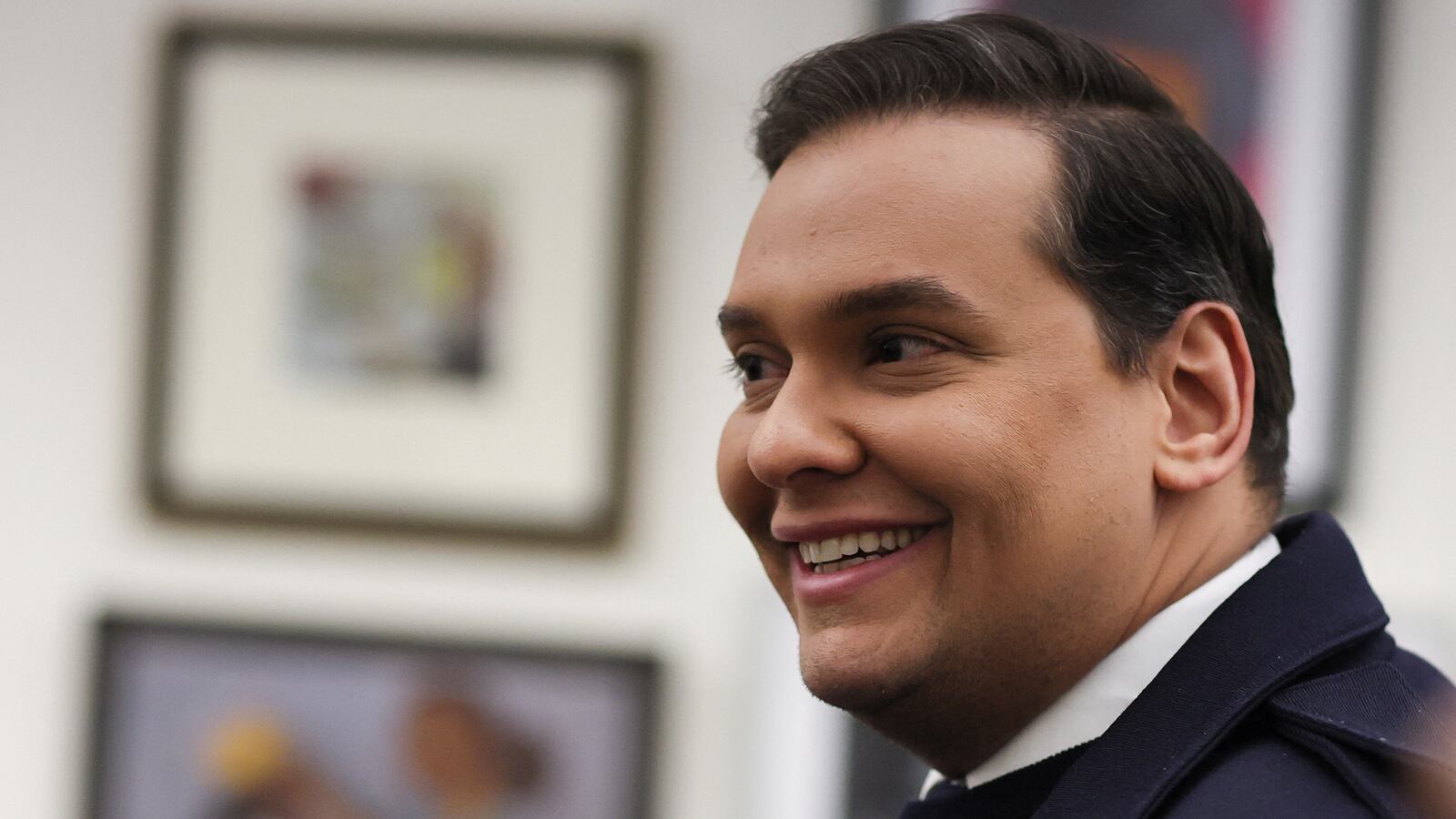 George Santos (R-NY) walks to a series of votes including a vote to expel him from the House of Representatives