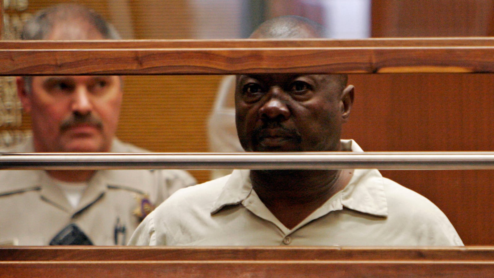 articles/2013/03/21/the-grim-sleeper-s-trial-is-moving-at-snail-s-pace-and-victims-families-are-furious/130320-grim-sleeper-drags-pelisek-tease_v2dqfg