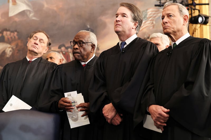 WASHINGTON, DC - JANUARY 20: U.S. Associate Supreme Court Justices Samuel Alito, Jr., Clarence Thomas and Brett Kavanaugh and U.S. Supreme Court Chief Justice John Roberts look on during inauguration ceremonies in the Rotunda of the U.S. Capitol on January 20, 2025 in Washington, DC. Donald Trump takes office for his second term as the 47th president of the United States.     Chip Somodevilla/Pool via REUTERS