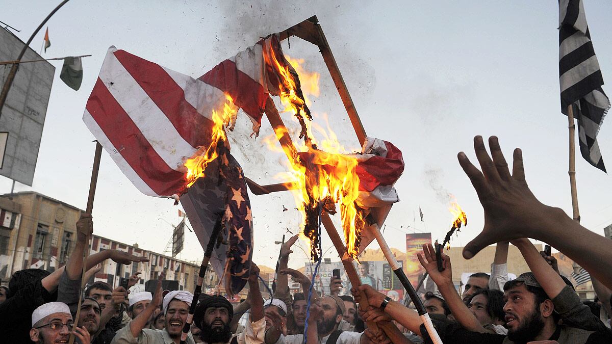 articles/2012/09/23/u-s-squandering-the-pr-opportunity-of-the-arab-spring/burn-us-flag-cheat_ktcb5b