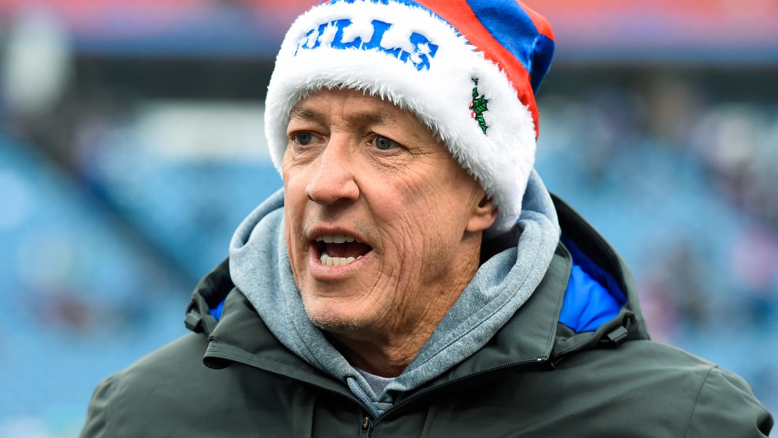 Hall of Fame quarterback Jim Kelly standing.