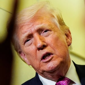 U.S. President Donald Trump talks to members of the media aboard Air Force One en route to Joint Base Andrews, Maryland, U.S., March 29, 2026. REUTERS/Elizabeth Frantz