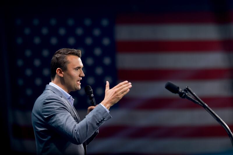 Charlie Kirk speaks in front of an American flag at a  Turning Point USA Believers Summit conference at the Palm Beach Convention Center on July 26, 2024 in West Palm Beach, Florida.