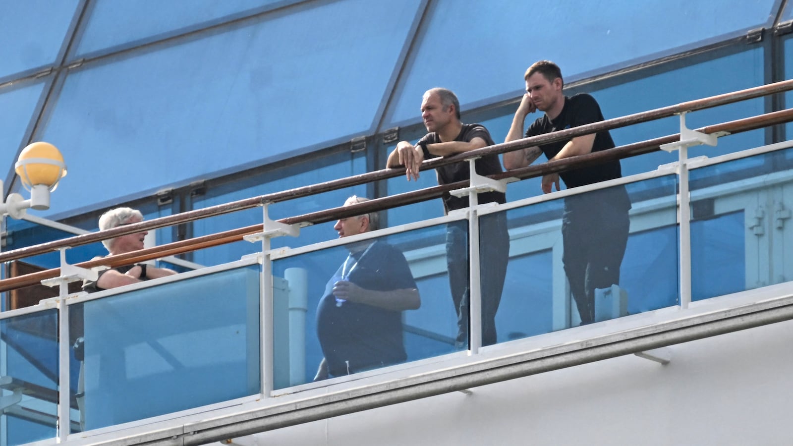 Tourists stand on the deck of the Sapphire Princess cruise at the Marina Pez Vela Cruise Terminal in Puerto San Jose, Guatemala on October 5, 2024, during the start of the 2024-2025 cruise season. (Photo by JOHAN ORDONEZ / AFP) (Photo by JOHAN ORDONEZ/AFP via Getty Images)