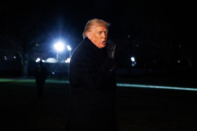 U.S. President Donald Trump makes a brief statement to reporters before departing from the South Lawn of the White House in Marine One on January 20, 2026 in Washington, DC.