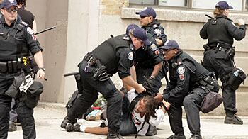 cheats/2010/06/27/500-protesters-arrested/g20-protestors-arrested_p7otkj