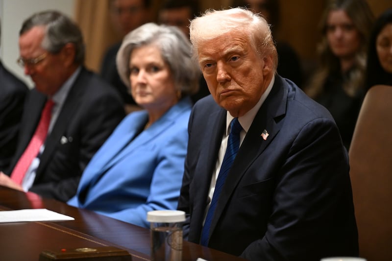 President Donald Trump, pictured with Chief of Staff Susan Wiles in March, defended her as "fantastic" despite her unfiltered observations to Vanity Fair.