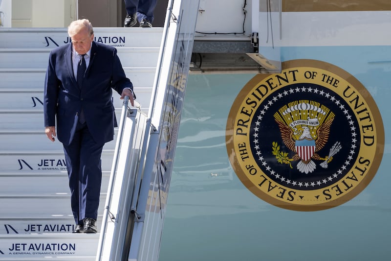 US President Donald Trump disembarks from Air Force One at Geneva Airport for France's G7 summit in Evian (France), in Geneva, Switzerland, Monday, June 15, 2026.  MARTIAL TREZZINI/Pool via REUTERS