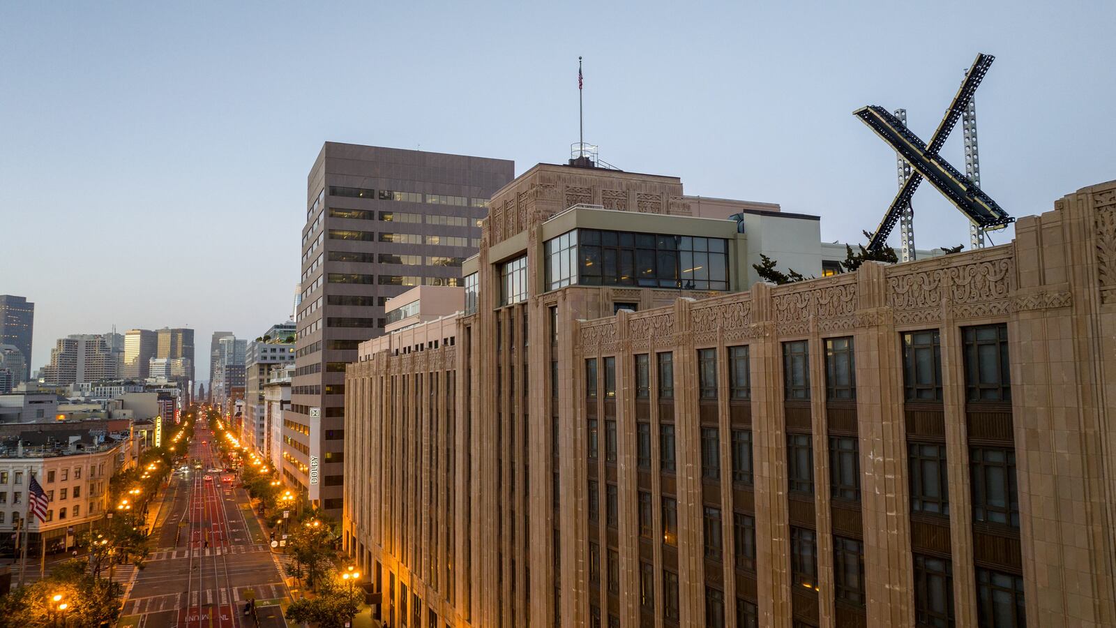 City officials in San Francisco attempted to visit the headquarters of Twitter—recently renamed “X” by new owner Elon Musk—twice over the weekend to investigate a giant, strobing light-up sign placed on the building’s roof.