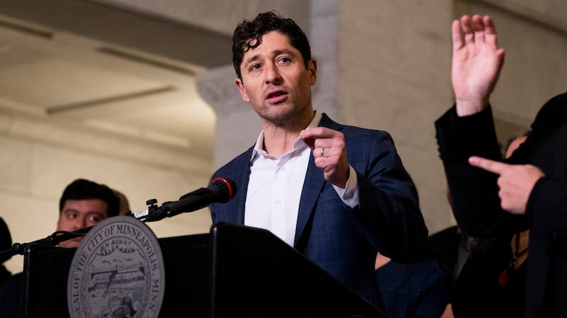 MINNEAPOLIS, MINNESOTA - JANUARY 09: Minneapolis Mayor Jacob Frey (C) speaks during a press conference at City Hall on January 09, 2026 in Minneapolis, Minnesota. Frey and local city officials are calling on federal investigators to turn over information to the Minnesota Bureau of Criminal Apprehension after the shooting death of Renee Good by a federal officer this week. (Photo by Stephen Maturen/Getty Images)