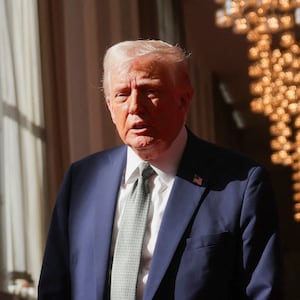 U.S. President Donald Trump speaks to the media after attending a board meeting at the Kennedy Center, in Washington, D.C., U.S., March 17, 2025. REUTERS/Carlos Barria