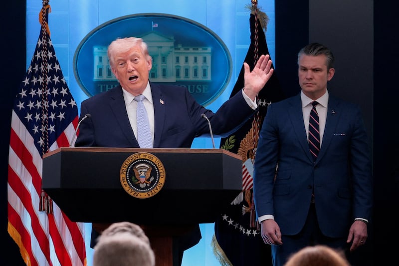 U.S. President Donald Trump holds a press conference accompanied by U.S. Secretary of Defense Pete Hegseth in the James S. Brady Press Briefing Room at the White House in Washington, D.C., U.S., April 6, 2026. REUTERS/Evan Vucci