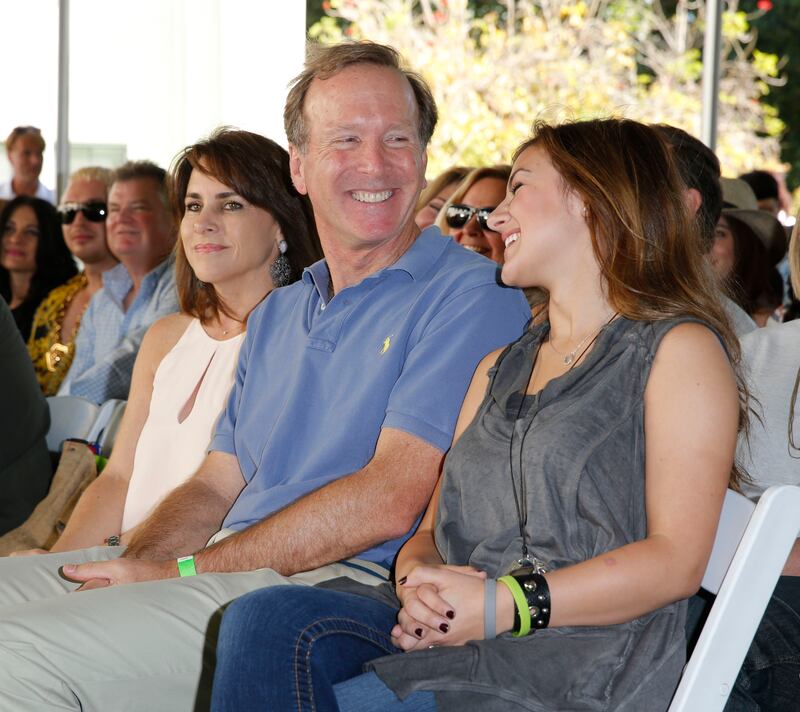 Neil Bush and Alexis Wilkins at a block party.