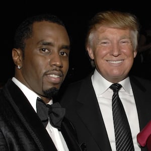 NEW YORK, NY - FEBRUARY 6: (L-R) Sean Combs, Donald Trump and Melania Trump attend GUCCI and MADONNA host A NIGHT TO BENEFIT RAISING MALAWI AND UNICEF at the United Nations on February 6, 2008 in New York City. (Photo by JOE SCHILDHORN/Patrick McMullan via Getty Images)