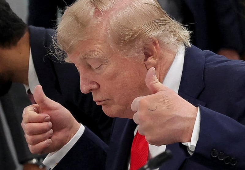 U.S. President Donald Trump gestures during a working session with G7 leaders and outreach partners on international investment partnerships at the G7 summit in Evian-les-Bains, France, June 16, 2026.  REUTERS/Christian Hartmann