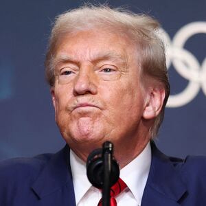 Donald Trump reacts after signing an executive order to create a White House Olympics task force to handle security and other issues related to the LA 2028 summer Olympics in the South Court Auditorium on the White House campus in Washington, D.C., U.S., August 5, 2025.