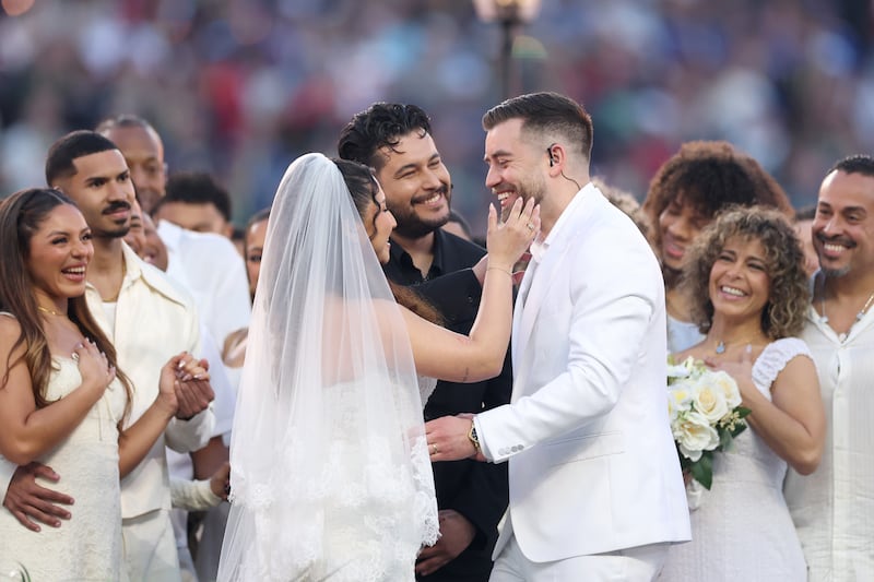 A couple marries during the Bad Bunny performance onstage.