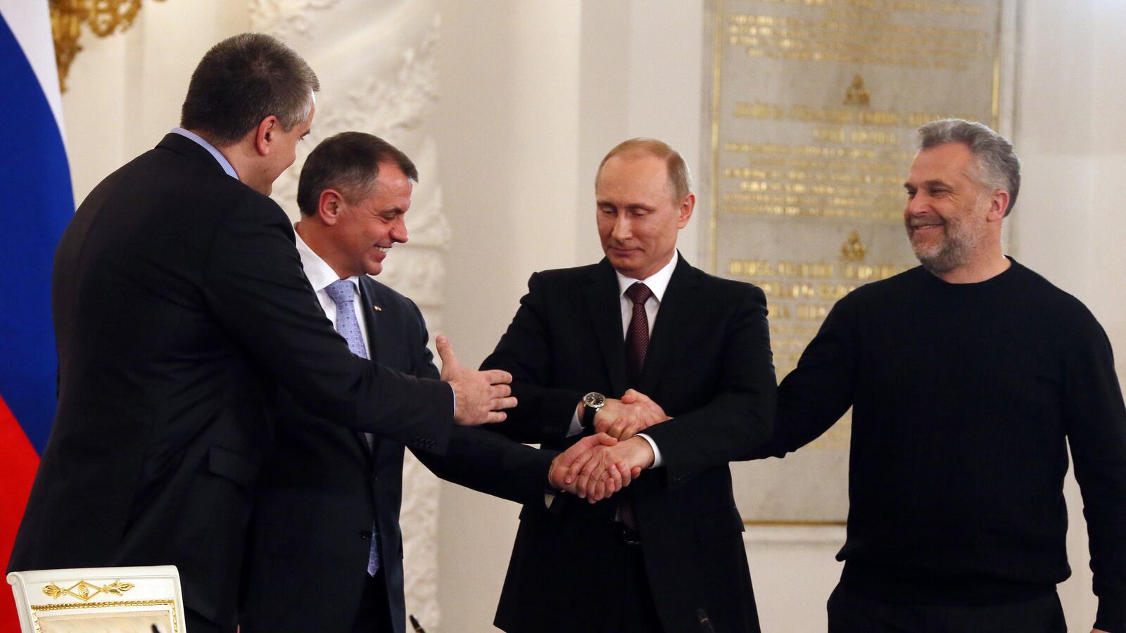 articles/2014/03/18/vladimir-putin-s-seizure-of-crimea-is-based-on-pure-fiction/140318-putin-olg-tease_olatoc