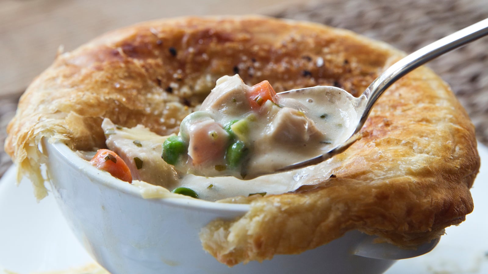 articles/2014/11/29/make-these-barefoot-contessa-chicken-pot-pies/141127-garten-recipe-chicken-potpie-tease_qvfz7j